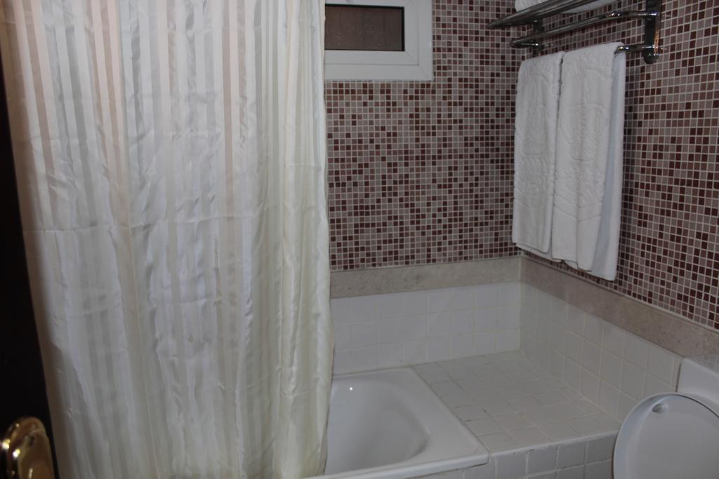 Tio Sea Resort Jor Exterior foto A shower curtain